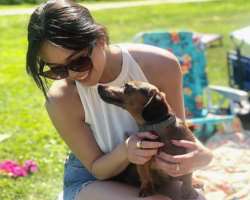 April loves to play with her dog.